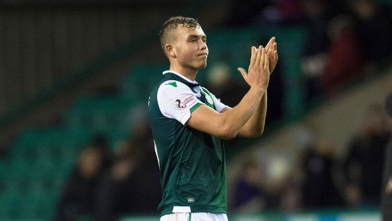 Hibernian's Ryan Porteous applauds the support 