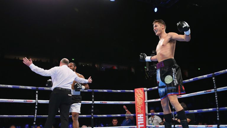 Anthony Crolla lands a right shot on Ricky Burns during the Lightweight contest at Manchester Arena on October 7, 2017 in Manchester, England.