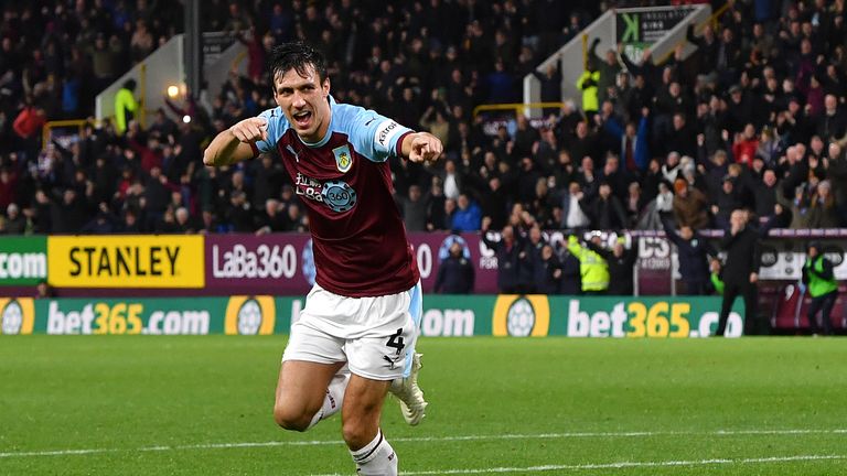 Burnley's Jack Cork celebrates after his shot deflects off team-mate James Tarkowski