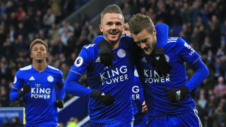 Jamie Vardy (R) celebrates with James Maddison after scoring Leicester's opening goal