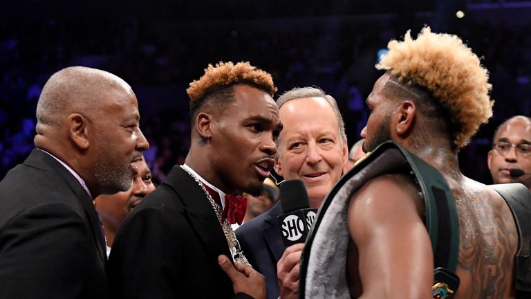 Jermall Charlo teases Jarrett Hurd after his third round knockout of Jason Welborn during the WBA-IBF-IBO Junior Middleweight Champioinship 