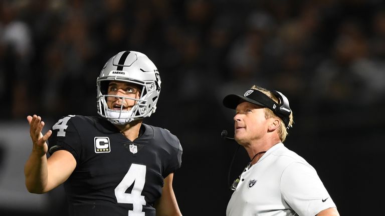 Jon Gruden (R) is the fourth head coach Derek Carr has had in five seasons with the Raiders