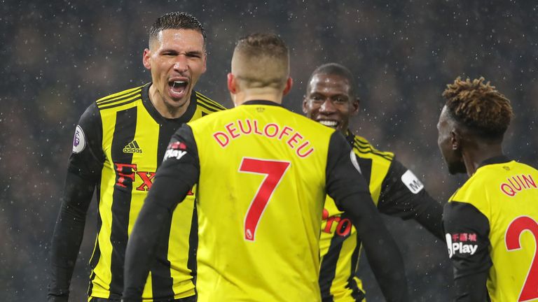 Jose Holebas celebrates with his Watford team-mates