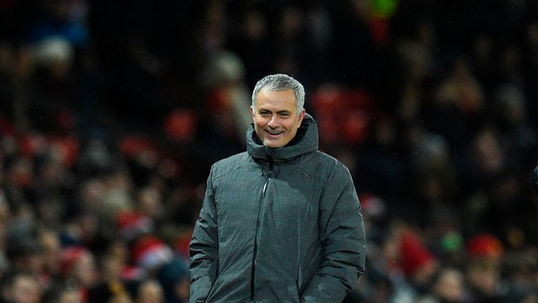 Manchester United's Portuguese manager Jose Mourinho laughs on the touchline during the English Premier League football match between Manchester United and Manchester City at Old Trafford in Manchester, north west England, on December 10, 2017