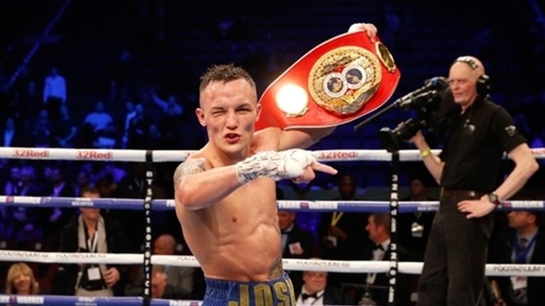 Josh Warrington celebrates winning the World Featherweight Championship against Carl Frampton at Manchester Arena.