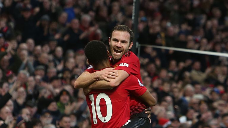 Juan Mata celebrates scoring Manchester United's second goal against Fulham