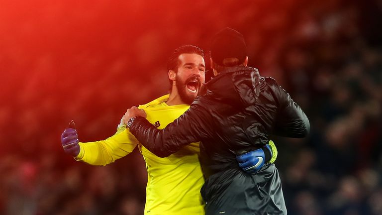 Jurgen Klopp celebrates Liverpool's 96th minute on the pitch with Alisson