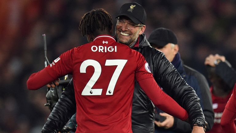 Jurgen Klopp embraces Divock Origi at full-time