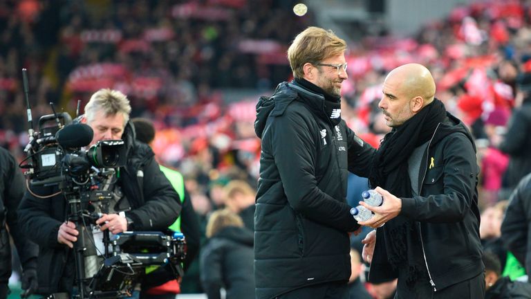 Jurgen Klopp and Pep Guardiola at Anfield