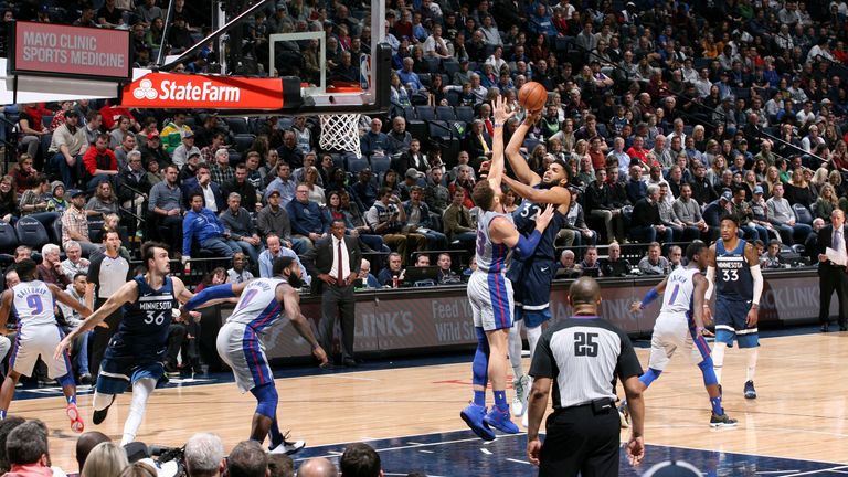 Karl-Anthony Towns of the Minnesota Timberwolves shoots the ball against the Detroit Pistons