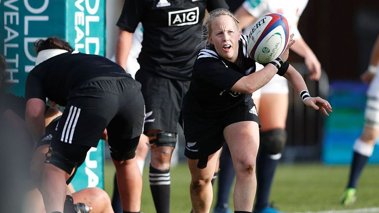 New Zealand's scrum-half Kendra Cocksedge passes the ball during a match against England at the Twickenham Stoop in 2016