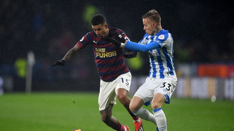 Kenedy is challenged by Florent Hadergjonaj