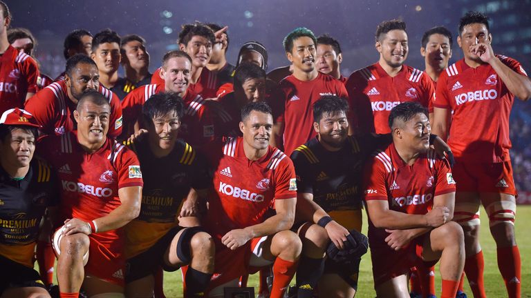 Dan Carter of Kobelco Steelers and players poses for photographs after the Rugby Top League match between Suntory Sungoliath and Kobelco Steelers at Prince Chichibu Memorial Ground on September 14, 2018 in Tokyo, Japan.