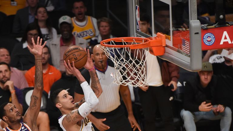 Kyle Kuzma #0 of the Los Angeles Lakers shoots the ball against the Phoenix Suns on December 2, 2018 at STAPLES Center in Los Angeles, California.