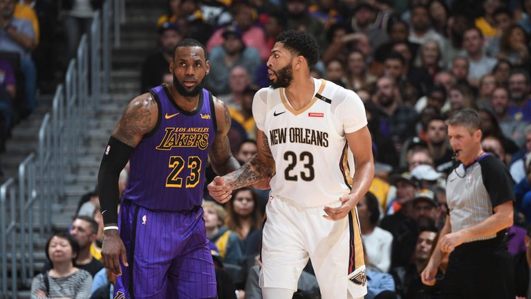 LeBron James #23 of the Los Angeles Lakers and Anthony Davis #23 of the New Orleans Pelicans fight for position during a game on December 21, 2018 at STAPLES Center in Los Angeles, California. Photo by Andrew D. Bernstein/NBAE via Getty Images) 