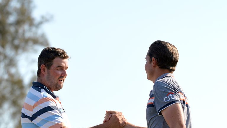 Marc Leishman (L) is Cameron Smith's nearest challenger 