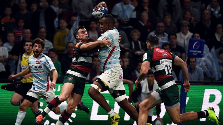 Racing's  Leone Nakarawa takes on Leicester's George Ford