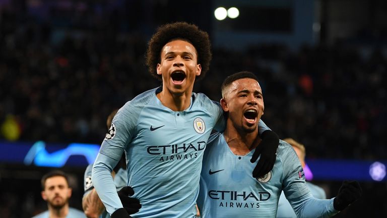 Leroy Sane of Manchester City celebrates scoring his sides first goal with Gabriel Jesus during the UEFA Champions League Group F match between Manchester City and TSG 1899 Hoffenheim at Etihad Stadium on December 12, 2018 in Manchester, United Kingdom