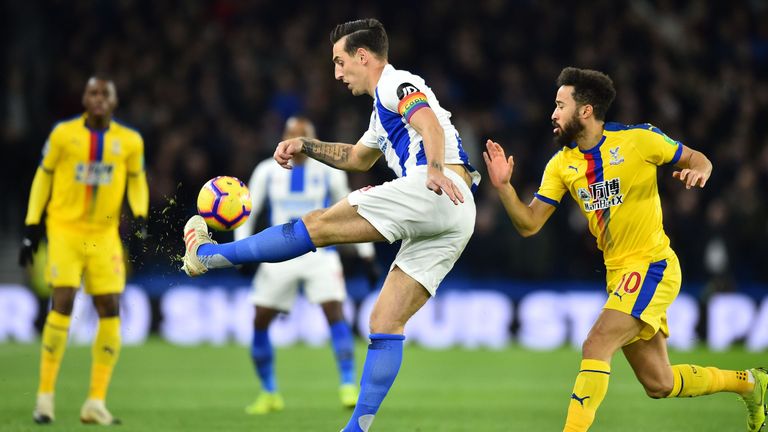 Lewis Dunk clears under pressure from Andros Townsend