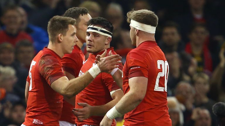 Liam Williams (L) celebrates with flanker Aaron Wainwright after scoring a try during the autumn international rugby union test match between Wales and South Africa