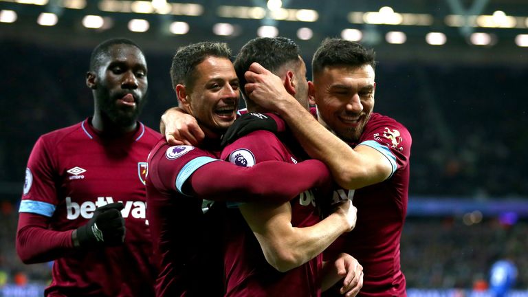 Lucas Perez celebrates with team-mates