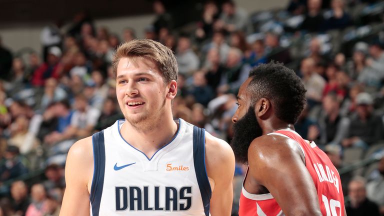 Luka Doncic #77 of the Dallas Mavericks smiles during a game against the Houston Rockets on December 8, 2018 at the American Airlines Center in Dallas, Texas