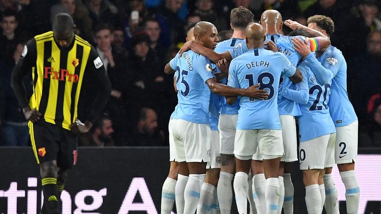 Manchester City players celebrate Leroy Sane's opener