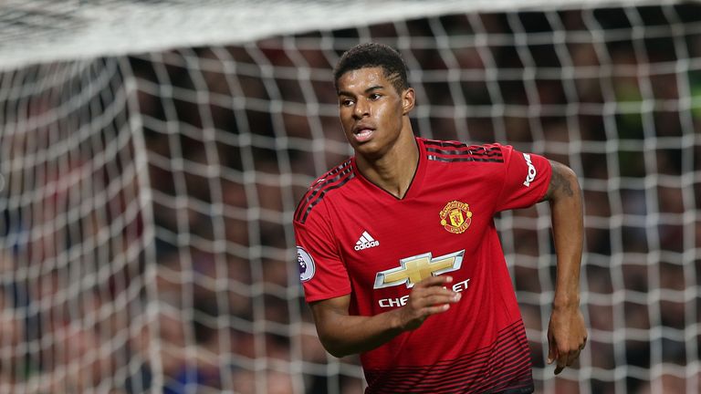 Marcus Rashford turns away from goal in celebration after scoring Manchester United's third goal