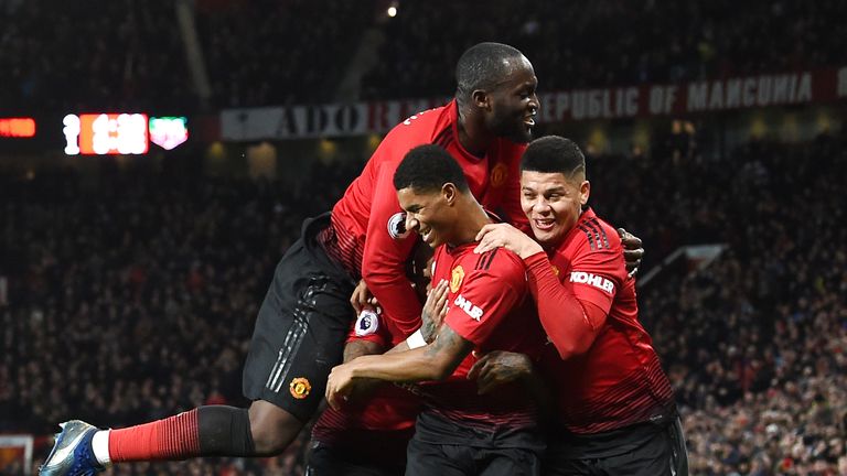 Marcus Rashford celebrates his goal with team-mates