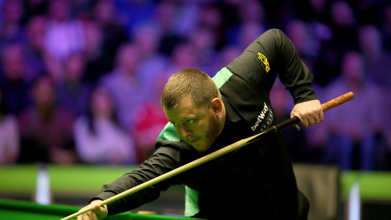 Mark Allen plays a shot in the final of the UK Championship