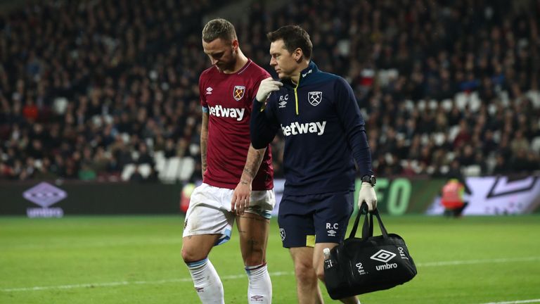 Marko Arnautovic leaves the pitch after picking up an injury