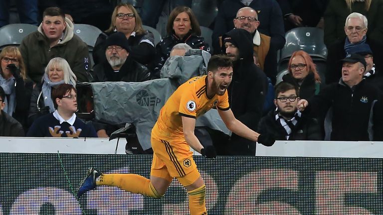 Wolverhampton Wanderers' Irish defender Matt Doherty celebrates after scoring their late winner during the English Premier League football match between Newcastle United and Wolverhampton Wanderers at St James' Park in Newcastle-upon-Tyne, north east England on December 9, 2018. - Wolves won the game 2-1.