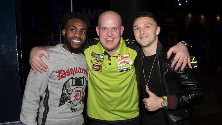 WILLIAM HILL WORLD DARTS CHAMPIONSHIP 2019.ALEXANDRA PALACE,.LONDON.PIC;LAWRENCE LUSTIG.ROUND 2.MICHAEL VAN GERWEN V ALAN TABERN.MICHAEL VAN GERWEN  with DANNY ROSE AND KIERAN TRIPPIER AFTER HIS VICTORY