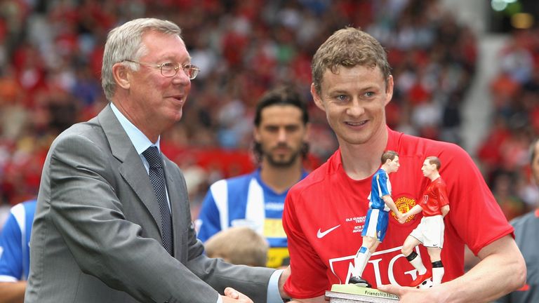 Manchester United manager Sir Alex Ferguson and Ole Gunnar Solskjaer shake hands prior to his testimonial friendly match between Manchester United and Espanyol at Old Trafford in 2008.