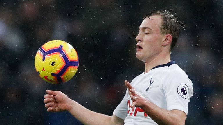 Oliver Skipp looks to control the ball