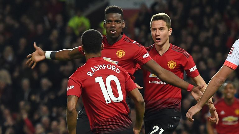 Paul Pogba celebrates with his team-mates