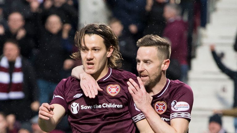 Hearts' Peter Haring (L) celebrates his goal with teammate Steven MacLean