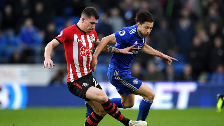 Pierre-Emile Hojbjerg is challenged by Harry Arter 