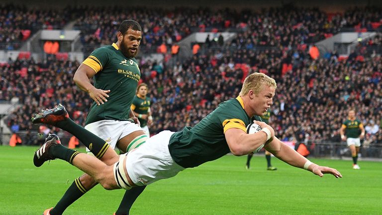 South Africa's lock Pieter-Steph du Toit scores their first try during the international rugby union Test match between Barbarians and South Africa at Wembley Stadium in London on November 5, 2016. 