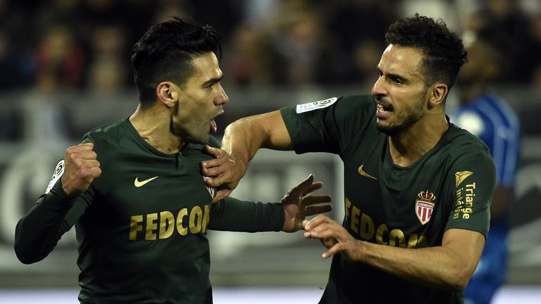 Radamel Falcao (L) celebrates after scoring one of two penalties against Amiens