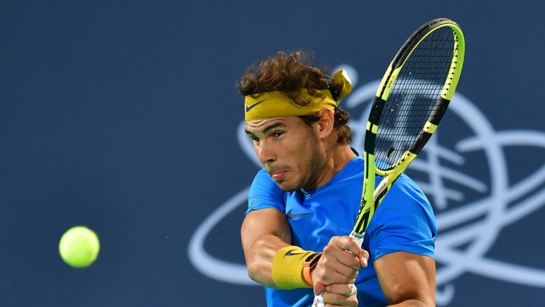 Spanish's Rafael Nadal returns the ball to South Africas Kevin Anderson during the Mubadala World Tennis Championship 2018 first Semi-final match in Abu Dhabi, on December 28, 2018