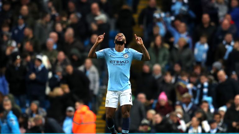 Raheem Sterling celebrates scoring Manchester City's second goal