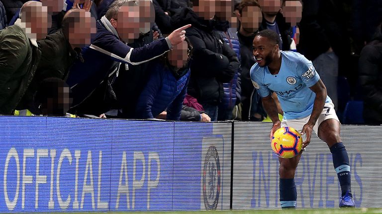Raheem Sterling collects the ball from pitchside at Stamford Bridge