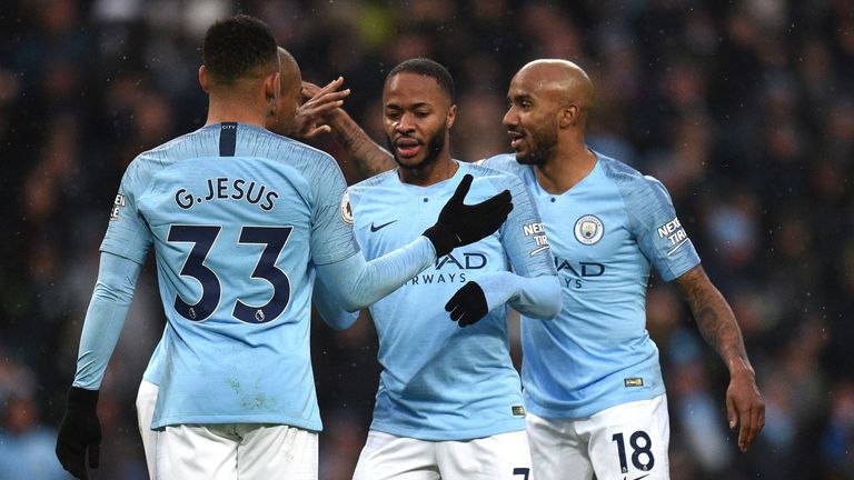 Raheem Sterling celebrates with team-mates