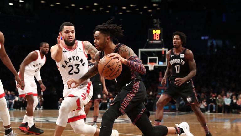 D&#39;Angelo Russell of the Brooklyn Nets drives against Fred VanVleet of the Toronto Raptors during their game on December 07