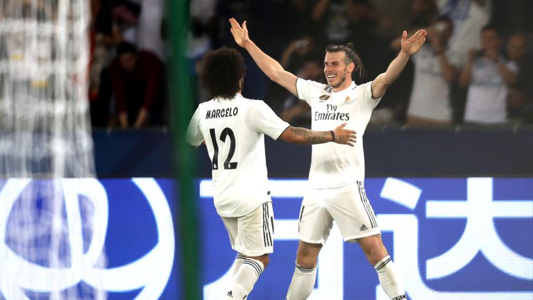 Gareth Bale celebrates scoring Real Madrid's third goal during the Club World Cup semi-final clash against Kashima Antlers.