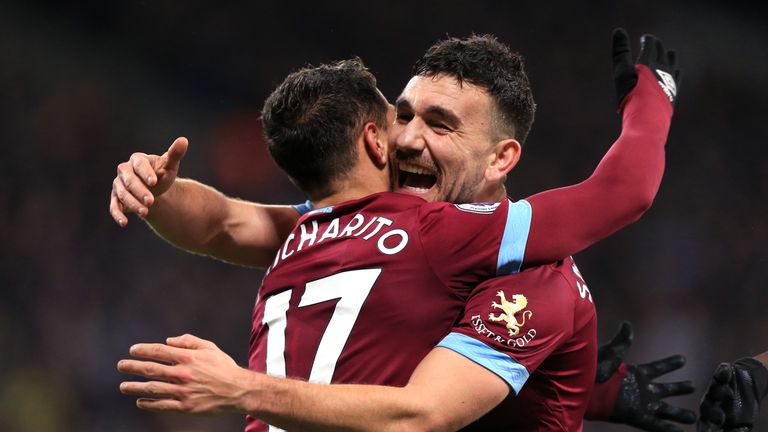 Robert Snodgrass and Javier Hernandez celebrate West Ham's second goal