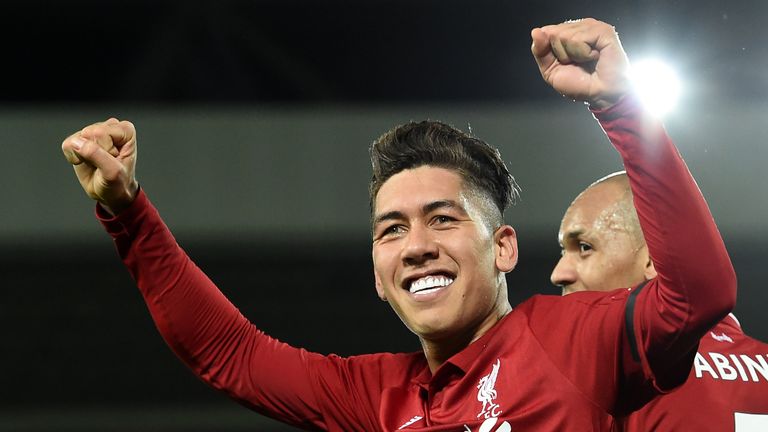 Roberto Firmino celebrates after completing his hat-trick