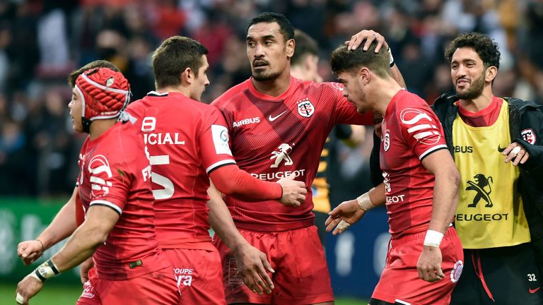 Toulouse's New Zealand flanker Jerome Kaino (C) jubilates with Toulouse's French centre Romain Ntamack (2nd R) after he scores a try during the European Champions Cup pool one rugby union match between Toulouse and Wasps, at the Ernest Wallon stadium in Toulouse, southern France on December 15, 2018