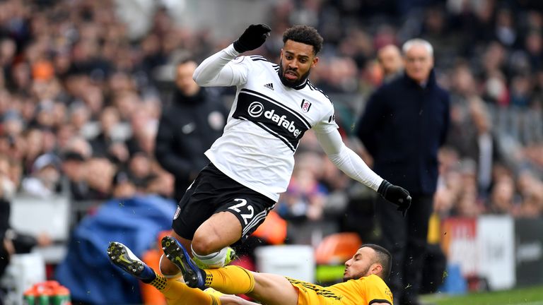 Romain Saiss tackles Cyrus Christie